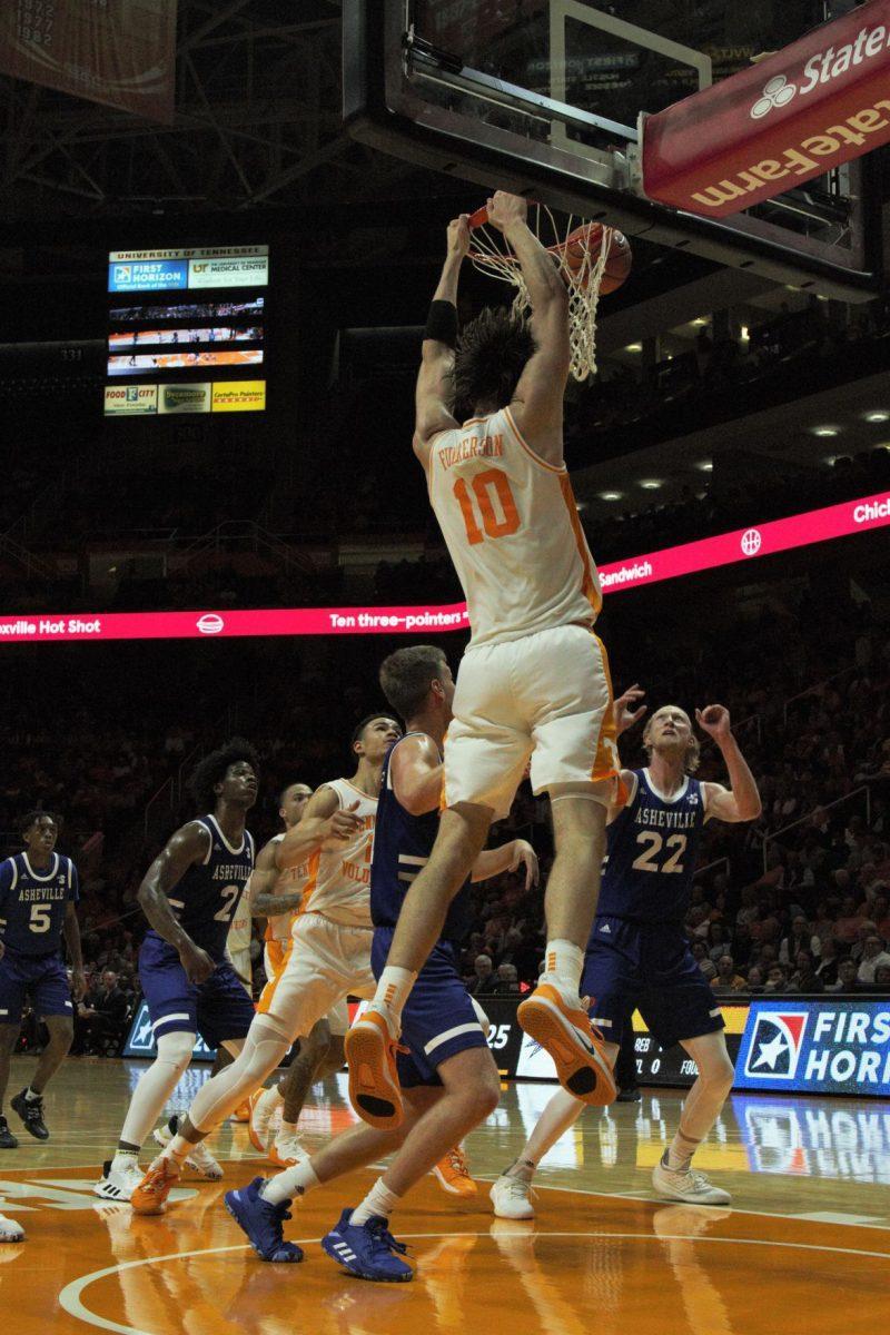 John Fulkerson, #10, dunks the ball in the game against UNC Asheville at Thompson-Boling Arena on Tuesday, November 5, 2019.