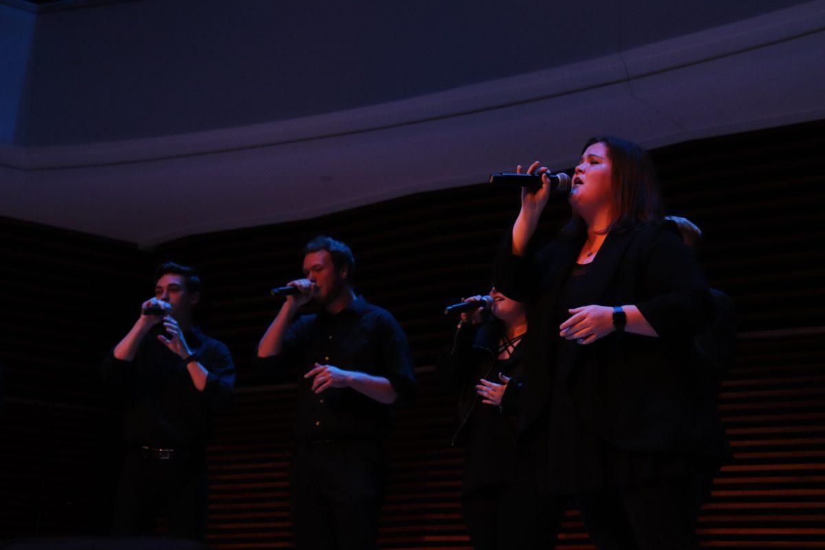 Hannah Maner pours her heart out into the microphone in her part of the UT Singers' performance of "Alone" by Billy Steinberg.