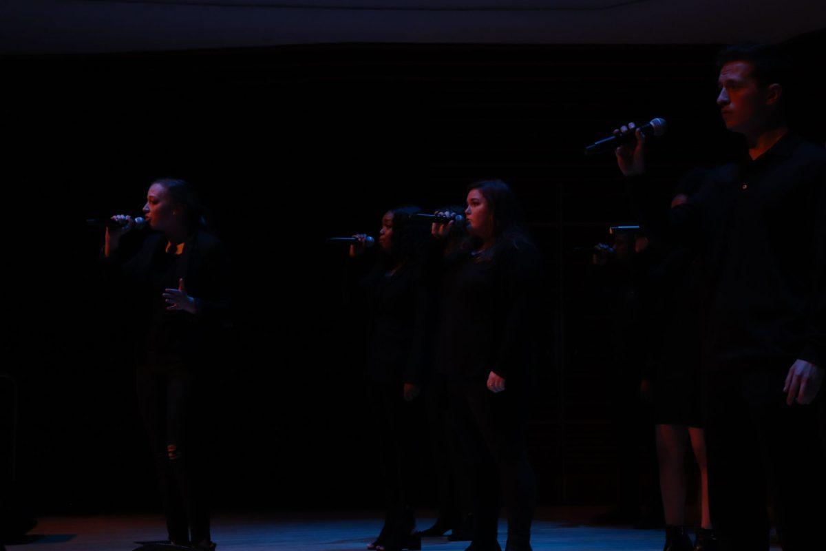 Jordyn Lantz (left) and Jack Rosamond (right) take the lead on the Singers' performance of "Alone" by Billy Steinberg during the Homecoming Concert on Friday, November 1, 2019.