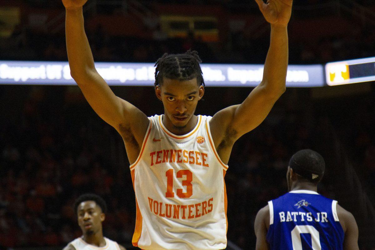 Jalen Johnson, #13, raises his hands after being fouled in the game against UNC Asheville at Thompson-Boling Arena on Tuesday, November 5, 2019.