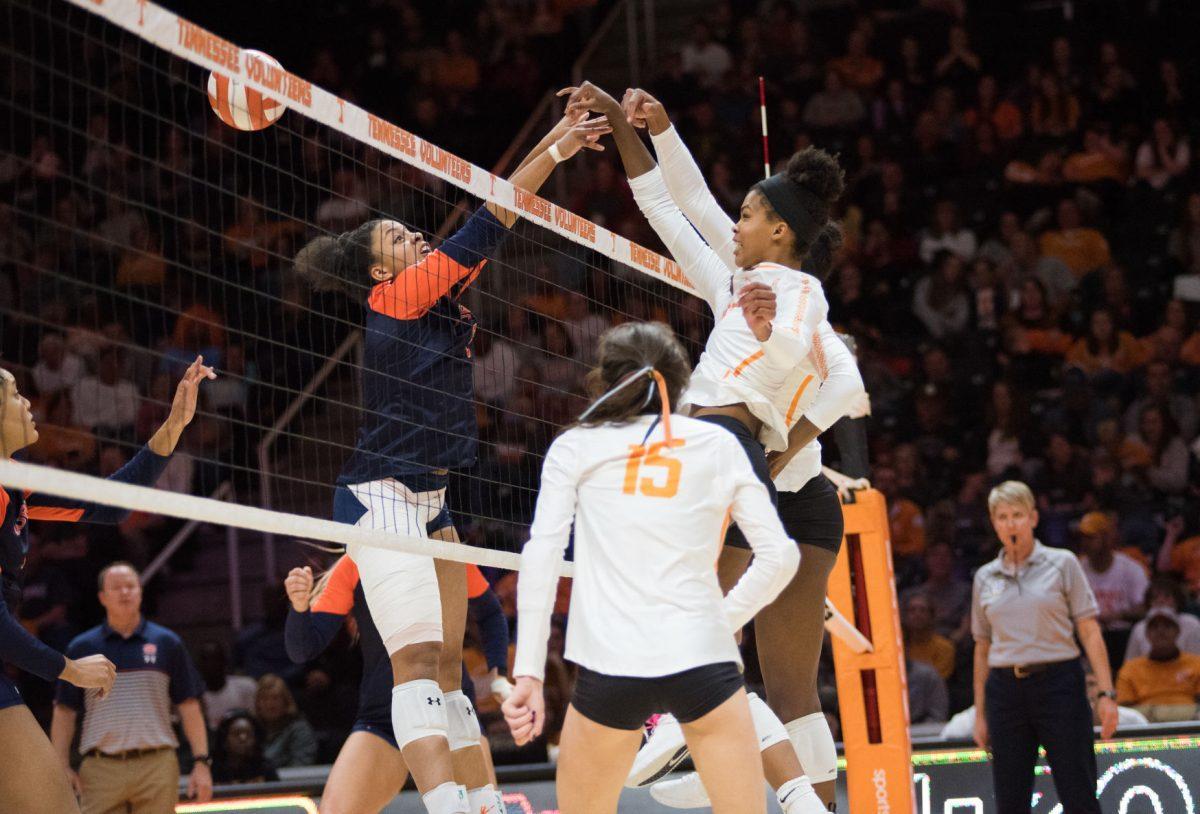 Tennessee's Addisyn Rowe (16) smacks the ball over the net during the game against Auburn University on Wednesday, November 27, 2019 at Thompson-Boling Arena.