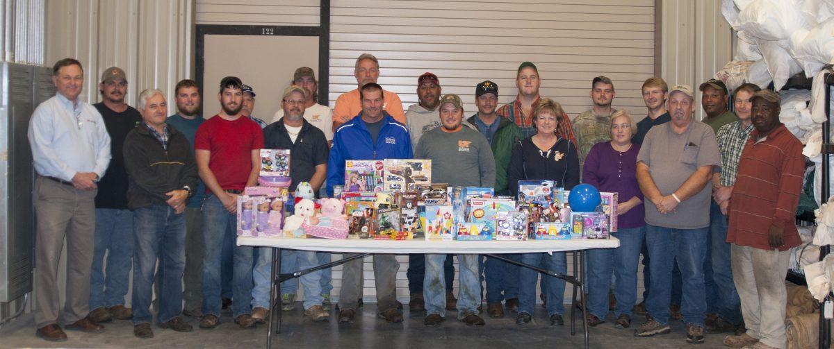 UTIA employees with donations from the 2015 Ryan McDonald and Colt Jones Memorial Toy Drive. Around one third of each year's toys are donated by UTIA employees.