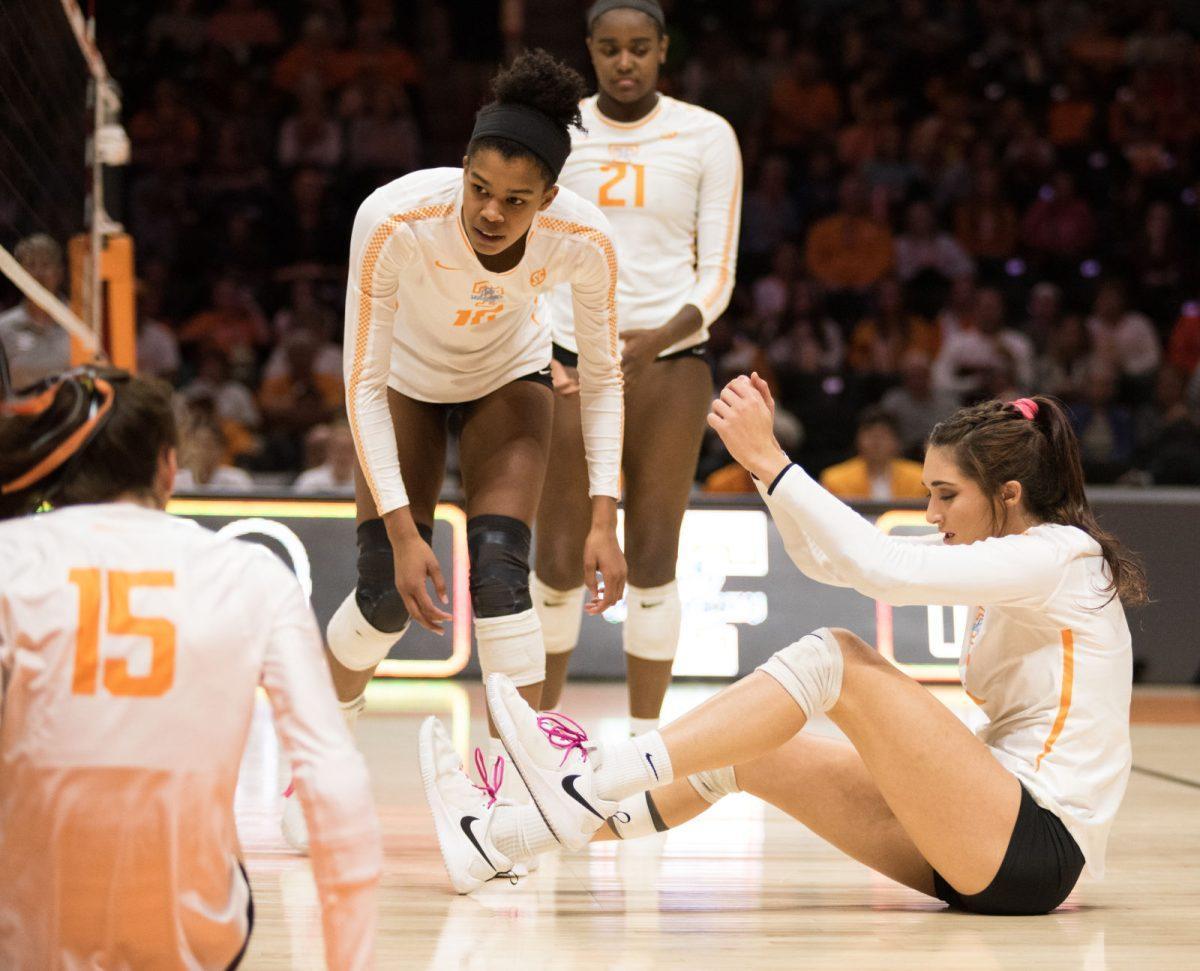Tennessee's Madison Coulter (3) falls to the ground after attempting to save the ball during the game against Auburn University on Wednesday, November 27, 2019 at Thompson-Boling Arena.