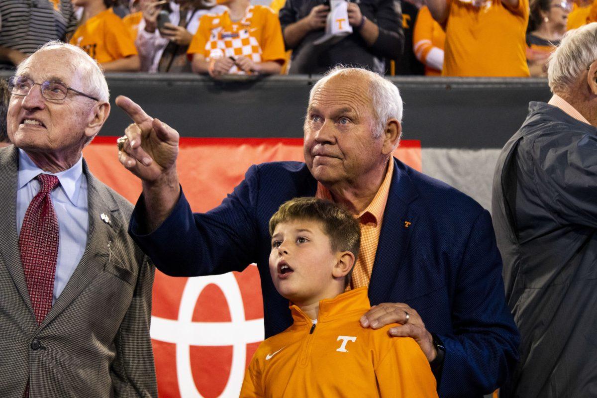 Head AD Phillip Fulmer with grandson pregame of the Tax Slayer Bowl in Jacksonville, Florida on Thursday, January 2, 2020.