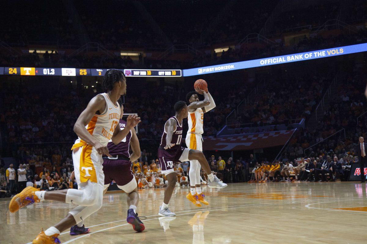 Jordan Bowden, #23, shoots a three pointer during the game against Texas A&amp;M on Tuesday, January 28, 2020 at Thompson-Boling Arena.