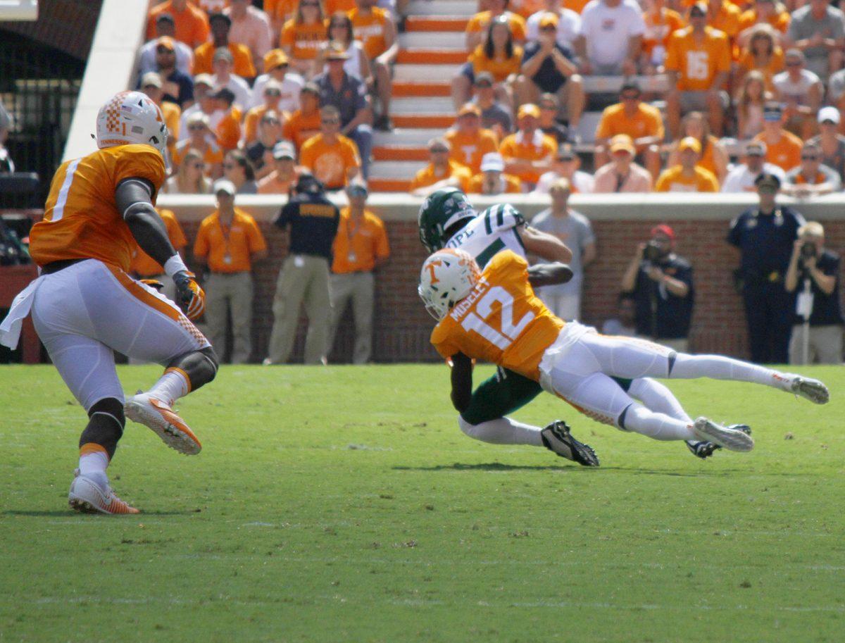 Emmanuel Moseley, #12, tackles a member of the Ohio Bobcats offense on Sep. 17, 2016.