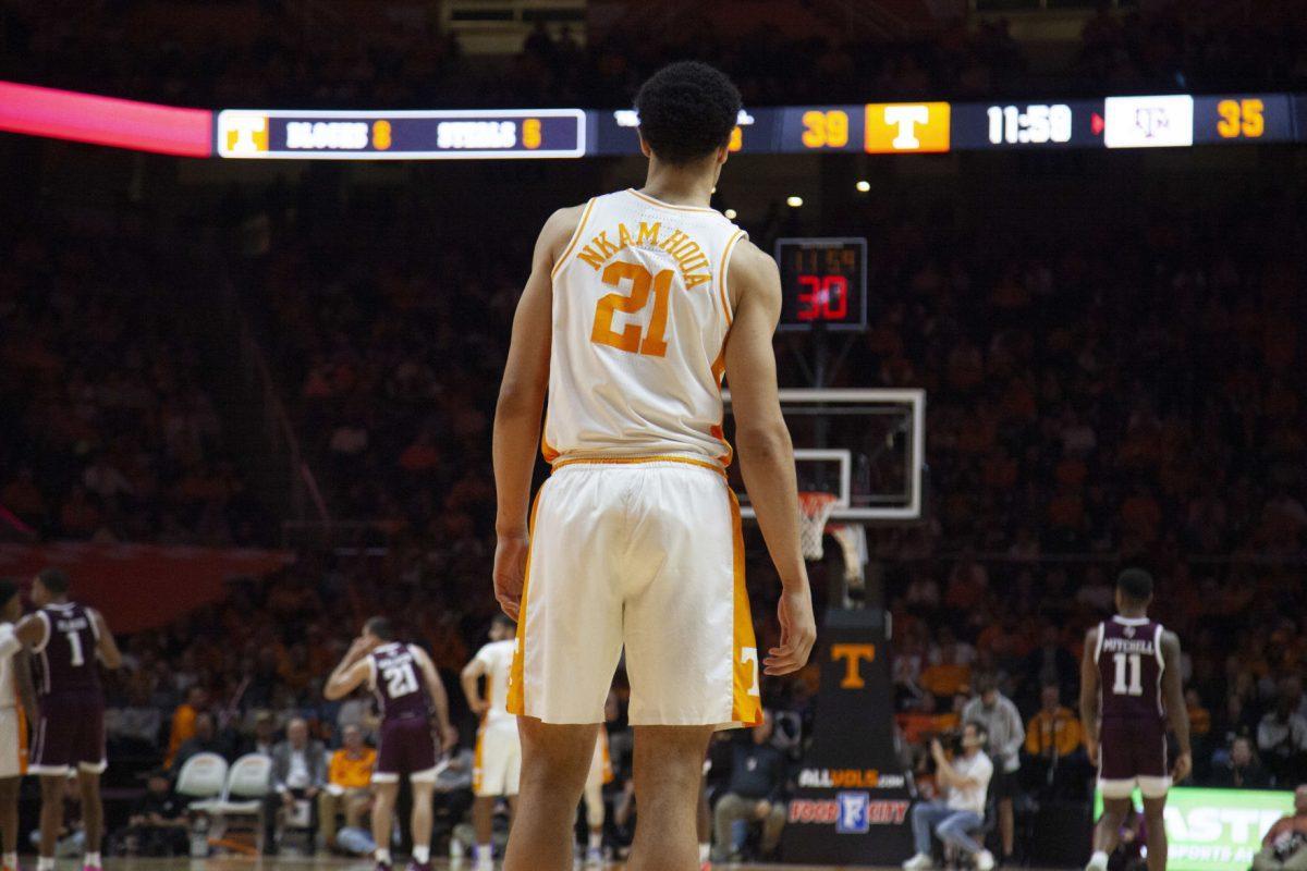 Olivier Nkamhoua, #21, waits for his teammates to bring the ball back down the court during the game against Texas A&amp;M on Tuesday, January 28, 2020 at Thompson-Boling Arena.