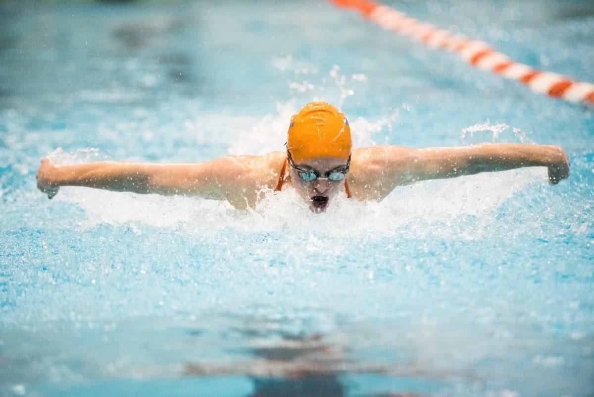 Tennessee's Erika Brown competes in the 100 meter butterfly race on Friday, November 8, 2019 at the Allan Jones Aquatic Center.