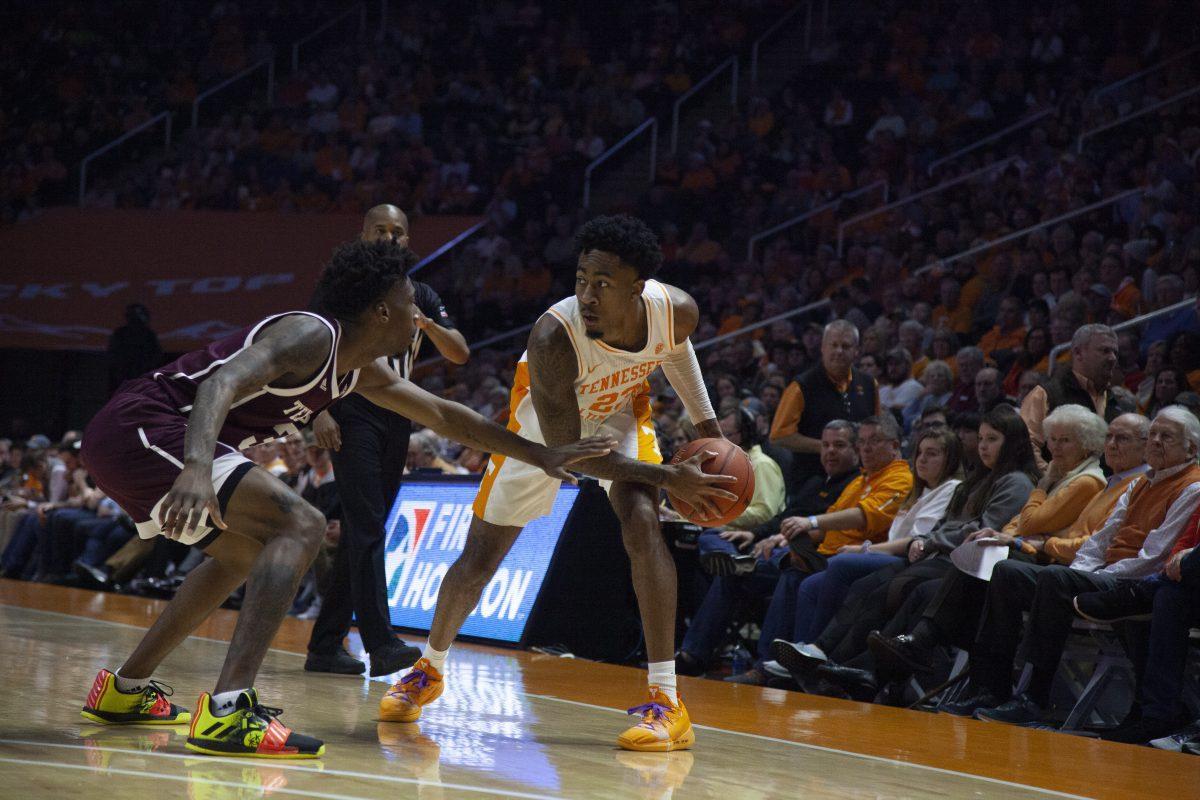 Jordan Bowden, #23, protects the ball while looking to pass during the game against Texas A&amp;M on Tuesday, January 28, 2020 at Thompson-Boling Arena.