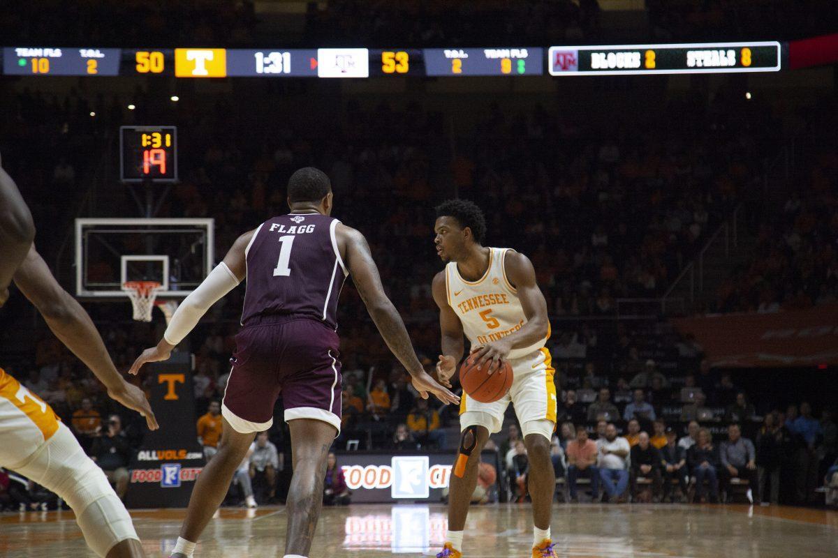 Josiah-Jordan James, #5, dribbles the ball during the game against Texas A&amp;M on Tuesday, January 28, 2020 at Thompson-Boling Arena.
