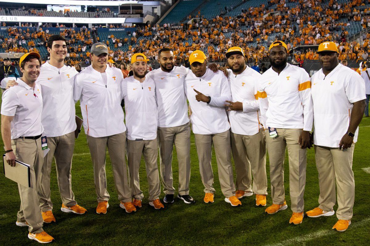 Assistant coaches for the Volunteers after the victory at the 2020 Tax Slayer Bowl game.
