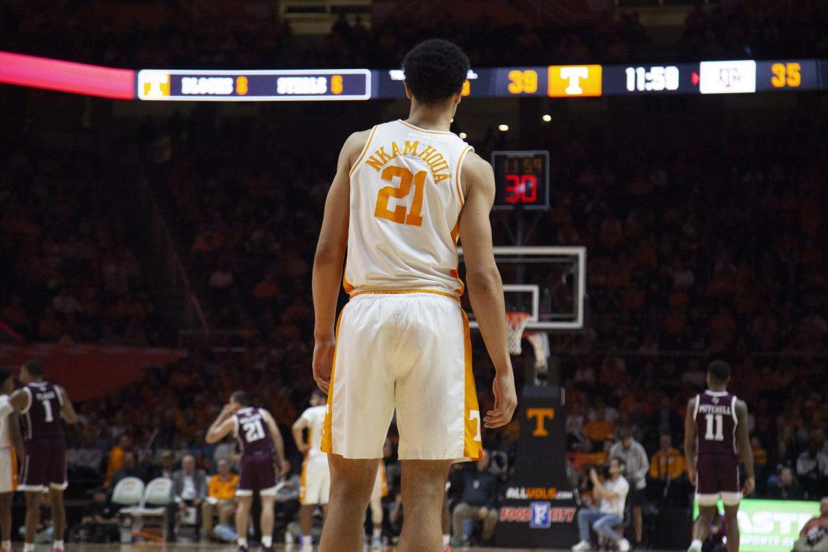Olivier Nkamhoua, #21, waits for his teammates to bring the ball back down the court during the game against Texas A&amp;M on Tuesday, January 28, 2020 at Thompson-Boling Arena.