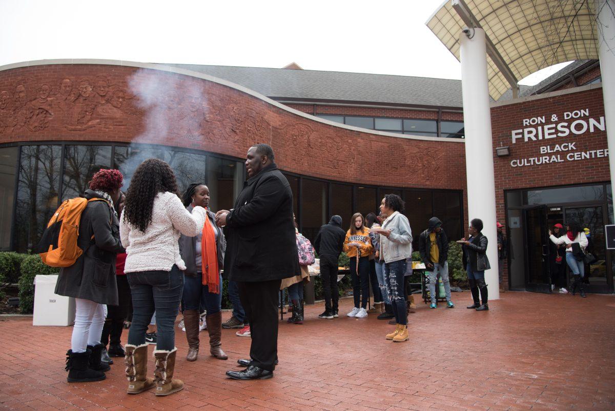 Students gather outside the Frieson Black Cultural Center on Melrose Avenue. After a drop in enrollment of Black students in fall 2021, Black students accounted for only 5% of all UT students. 
