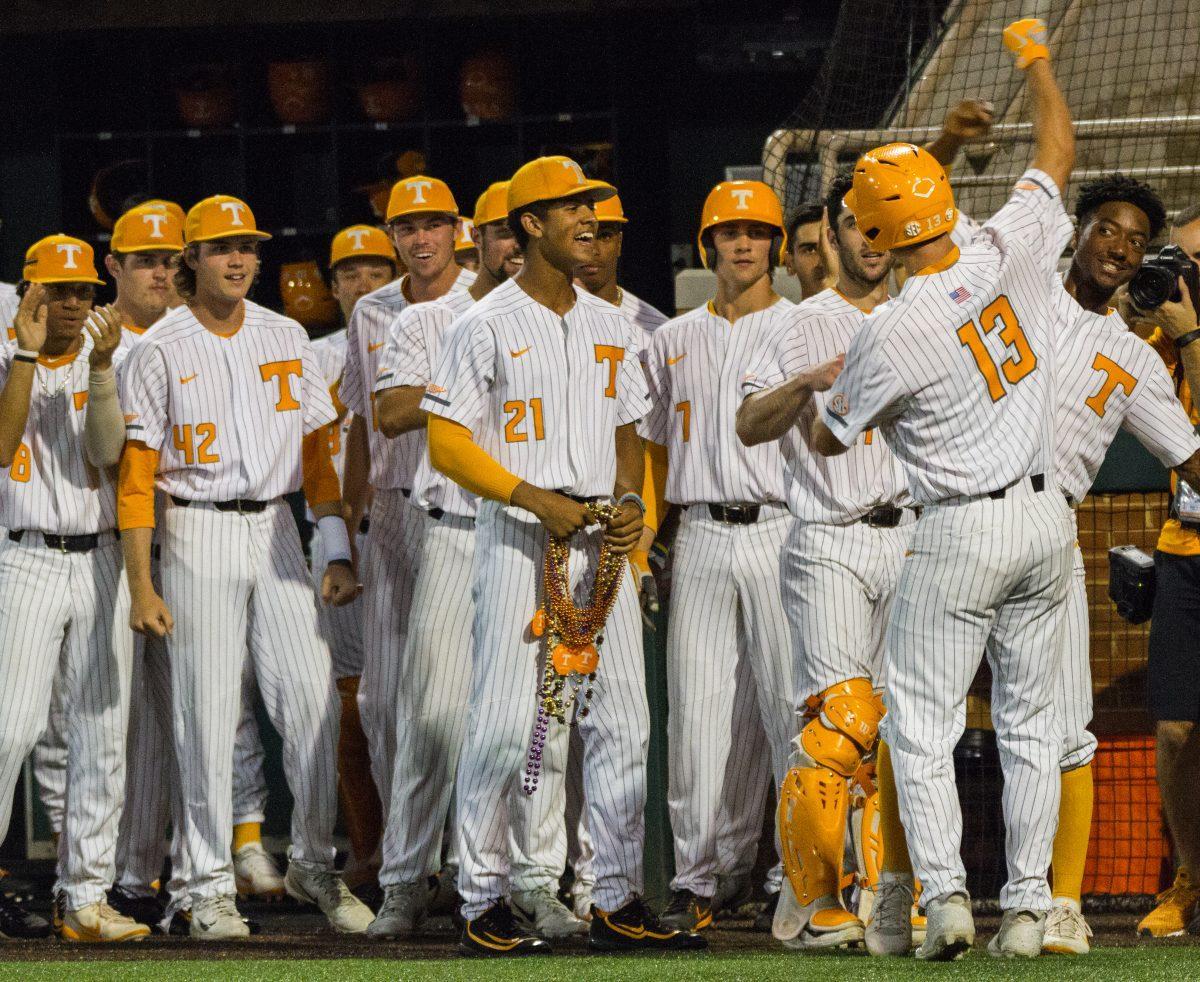 #13, Andre Lipcius celebrates with his team during the game against Ole Miss on Thursday, May 16, 2019.
