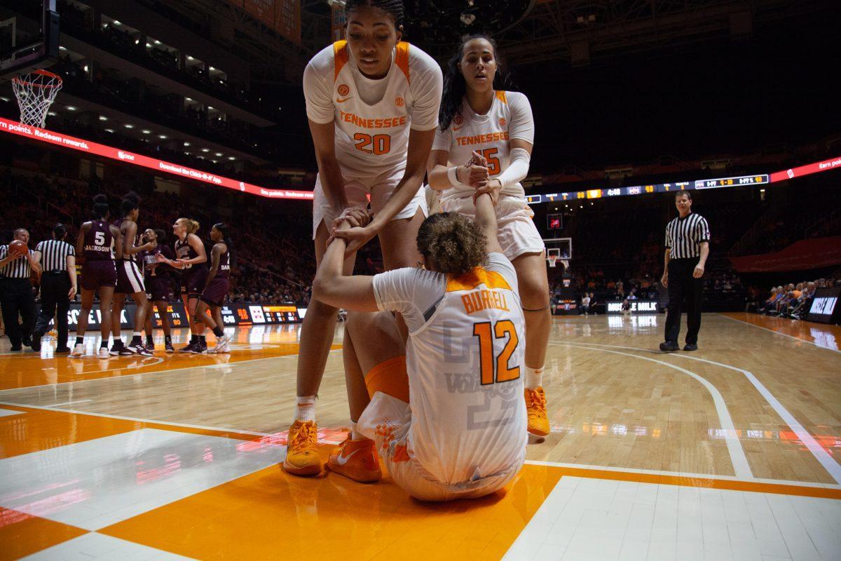 Lady Vols help their teammate, Rae Burrell, #12, up after she fell during the game against Mississippi State on Thursday, February 6, 2020 at Thompson-Boling Arena.