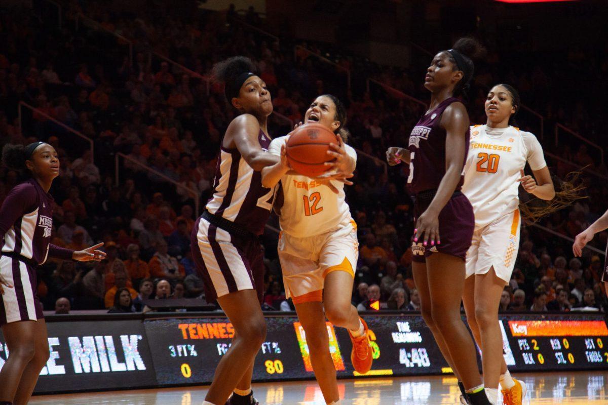 Rae Burrell, #12, fights to keep the ball during the game against Mississippi State on Thursday, February 6, 2020 at Thompson-Boling Arena.