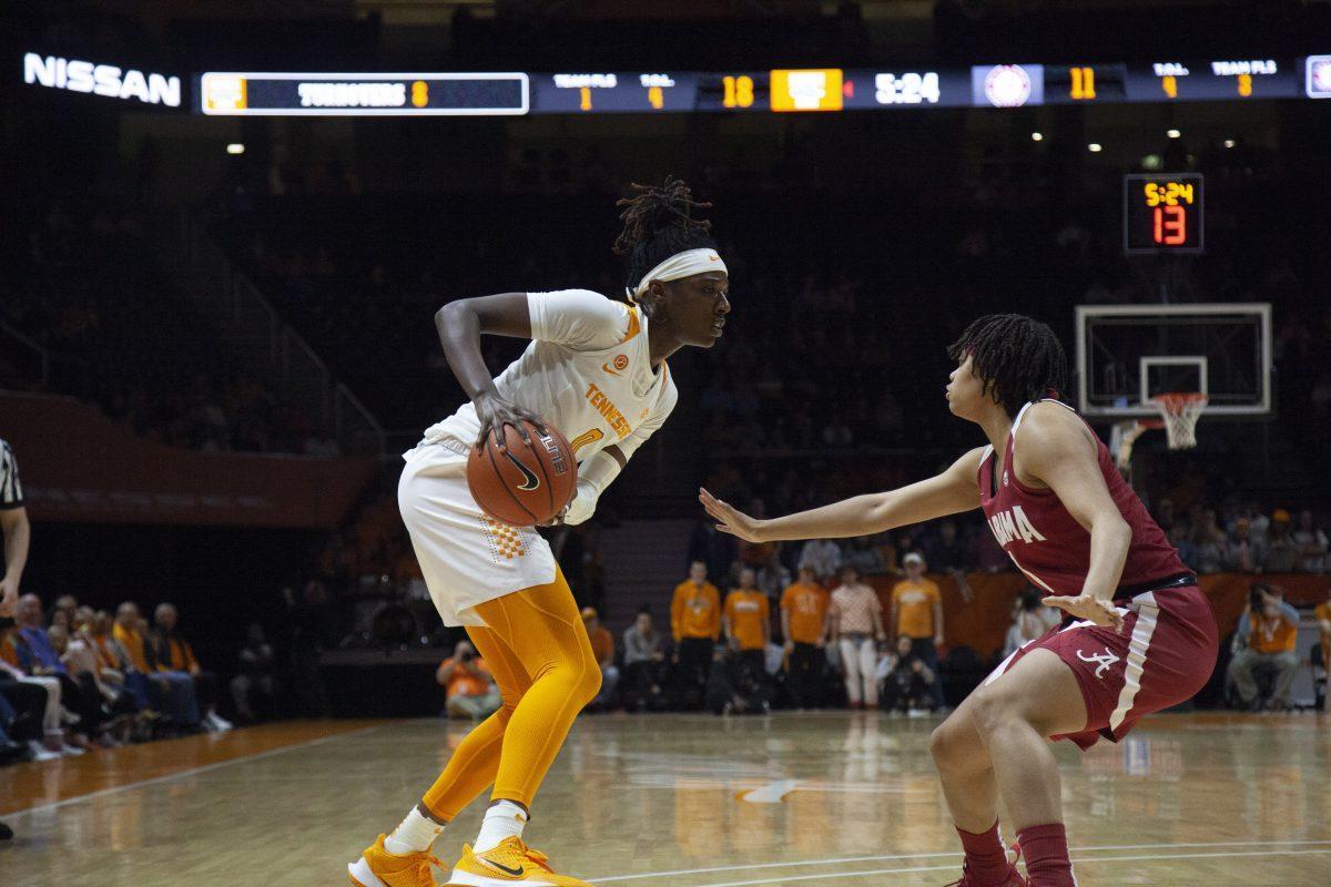 Rennia Davis, #0, guards the ball against an Alabama player during the game on Monday, January 20, 2020 at Thompson-Boling Arena.