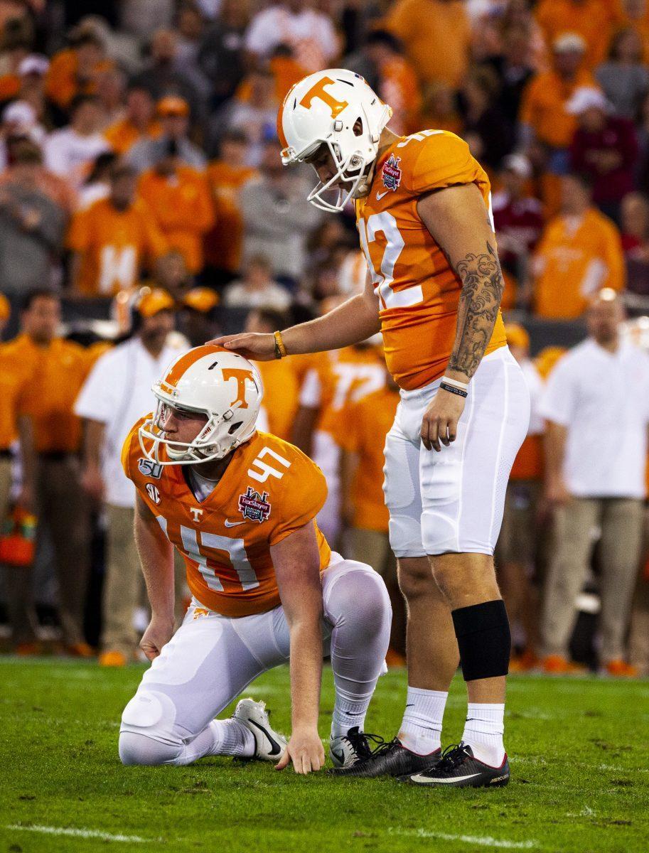 #42 Brent Cimaglia set to kick with #47 Joe Doyle with the hold for the Tennessee Volunteers facing Indiana in the 2020 Tax Slayer Bowl.