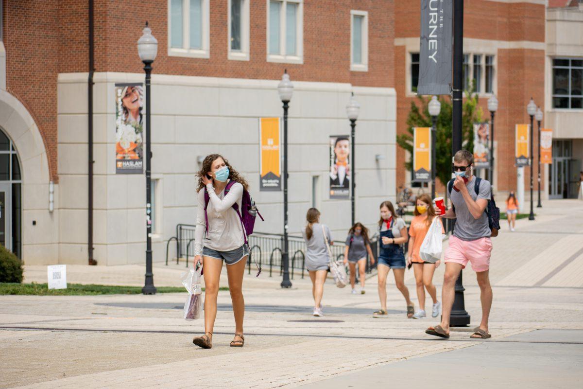 UT students walking to class while following the university's Covid-19 policies on Thursday, August 20, 2020.