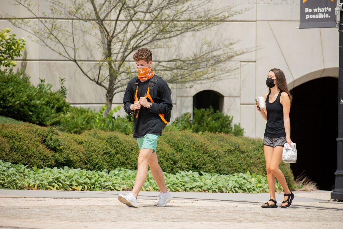 UT students walking to class while following the university's Covid-19 policies on Thursday, August 20, 2020.