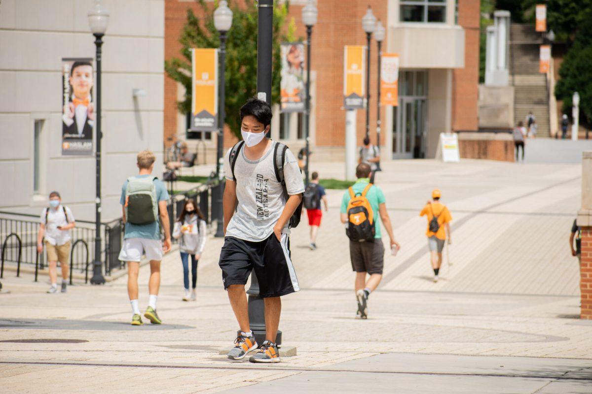 UT student walking to class while following the university's Covid-19 policies on Thursday, August 20, 2020.