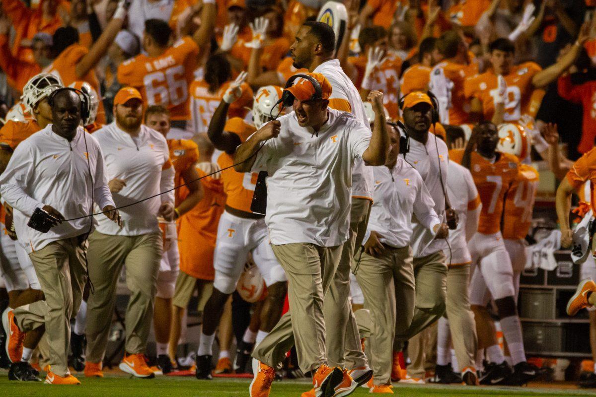 Jeremy Pruitt celebrates after a gain by Tennessee during a game between Tennessee and South Carolina at Neyland Stadium on Saturday, October 26, 2019.