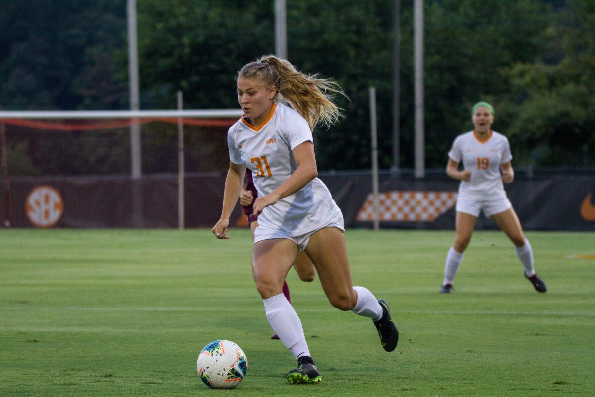 #31, Mackenzie George runs up the field with the ball during the game against Fordham University at Regal Stadium on August 22, 2019.