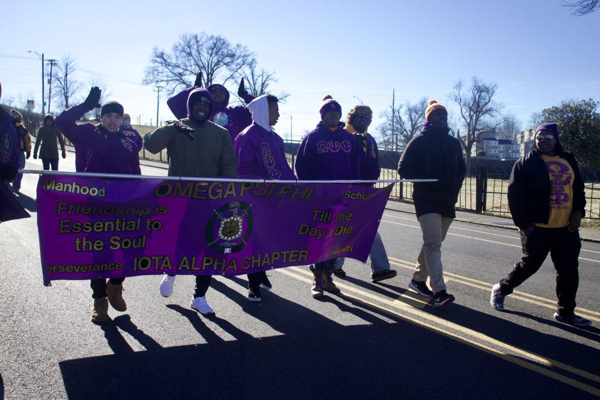 Brothers of the Omega Psi Phi Fraternity march in the MLK Day Parade on Jan. 21, 2019 in Chilhowee Park. 
