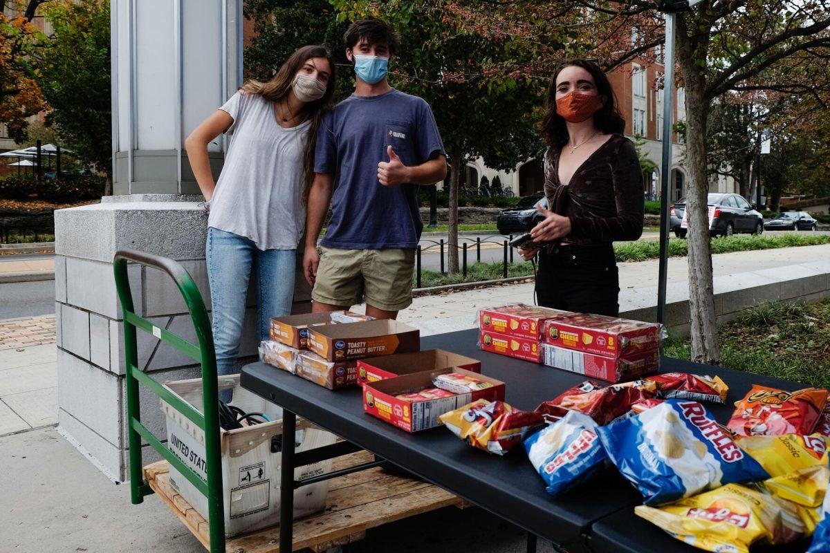 Volunteers man a snack table for voters at the Howard Baker Jr. Center on Oct. 26, 2020.