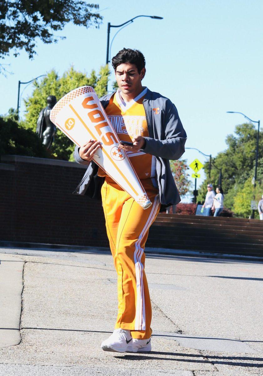 UT Cheerleader headed towards Neyland Stadium getting ready to cheer on the Vols for the game against Missouri on Oct. 3, 2020. 