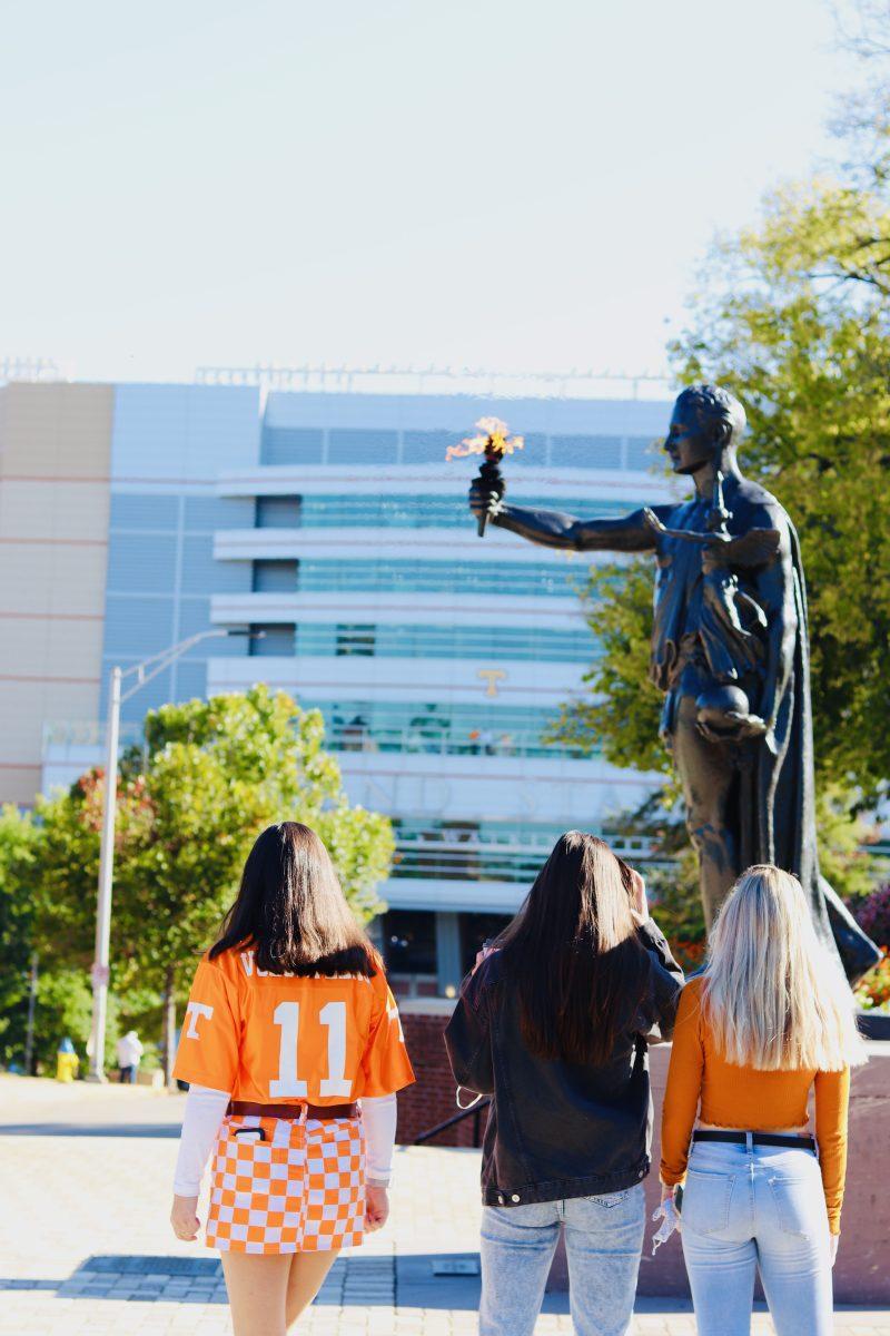 Three UT students walking to Neyland Stadium for the UT vs. Missouri game on Oct. 3, 2020. 