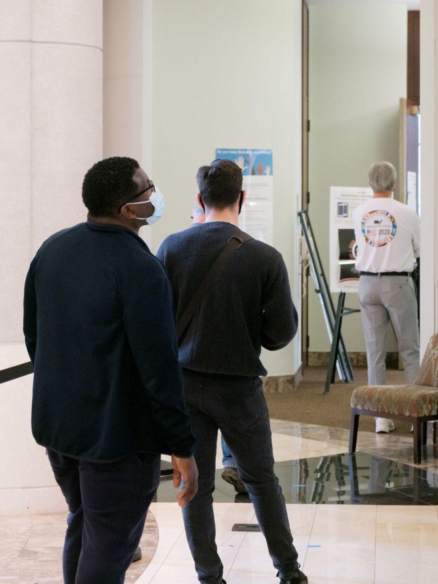 Voters wait in line to vote at Howard Baker Jr. Center on Oct. 26, 2020.