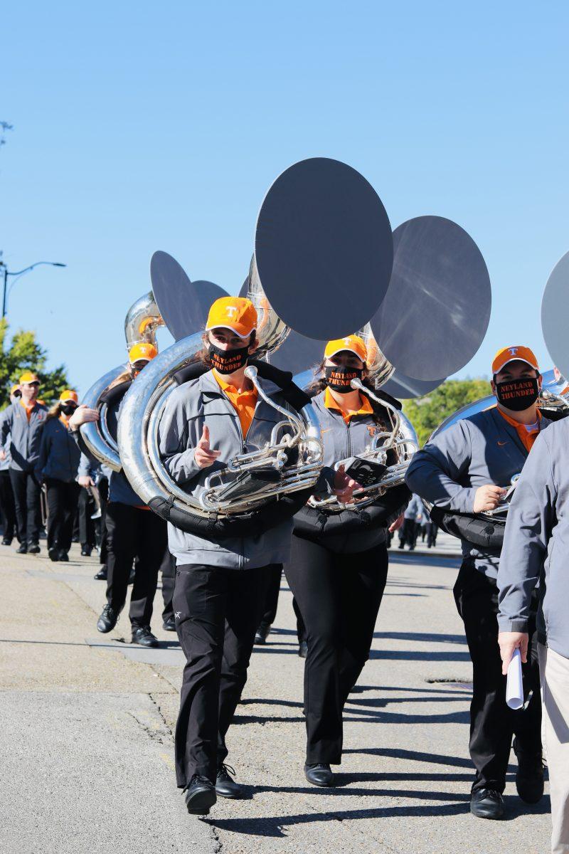 The UT band marching down Peyton Manning Pass towards Neyland Stadium for the first football home game vs. Missouri on Oct. 3, 2020.