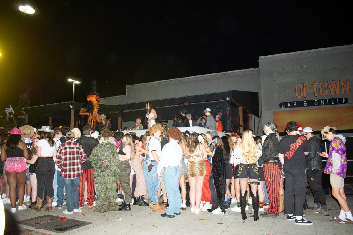 Uptown Bar &amp; Grille on Cumberland Avenue full of festive Halloween costumes despite the worries of COVID-19 on Oct. 31, 2020. 