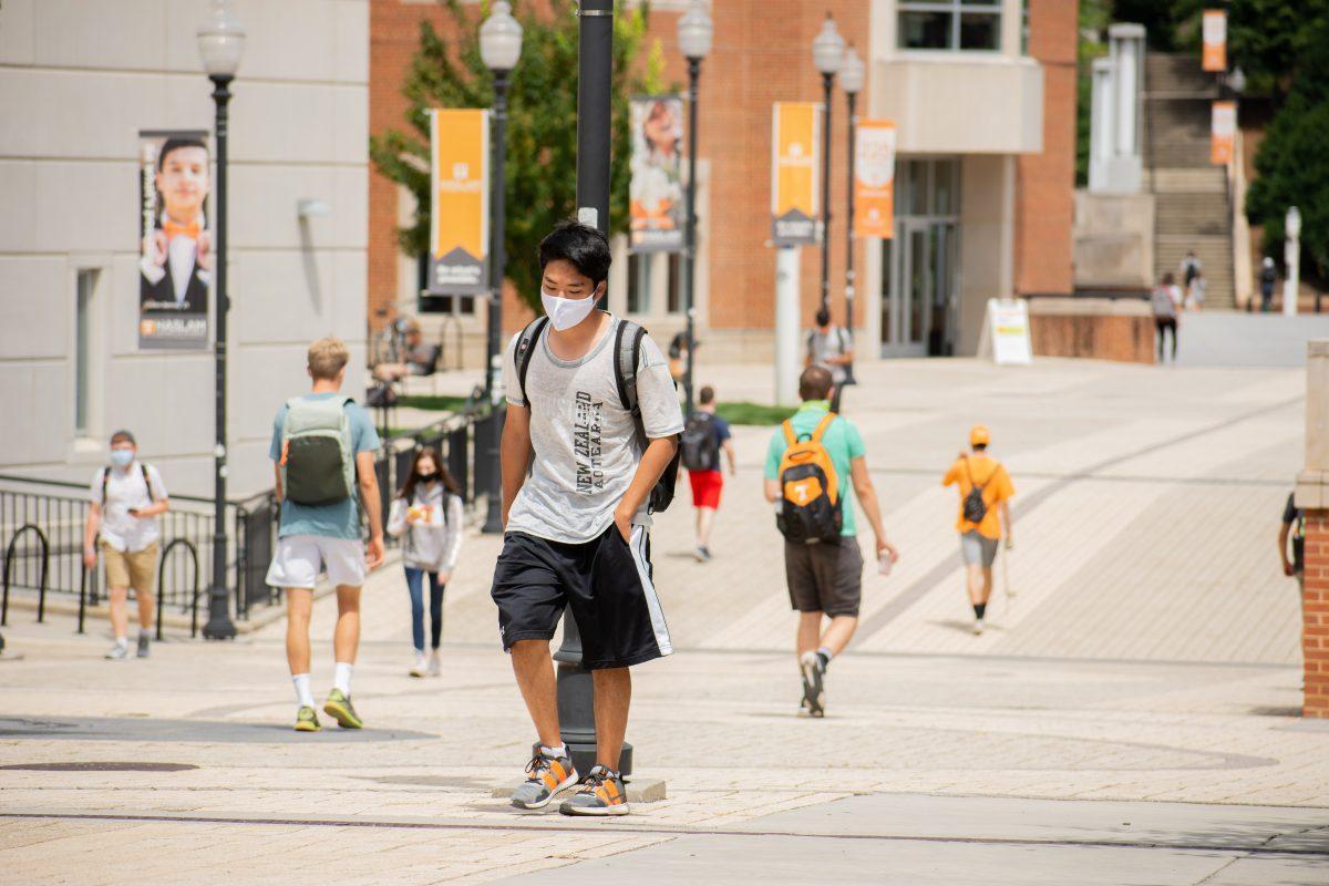 UT student walking to class while following the university's Covid-19 policies on Thursday, August 20, 2020.