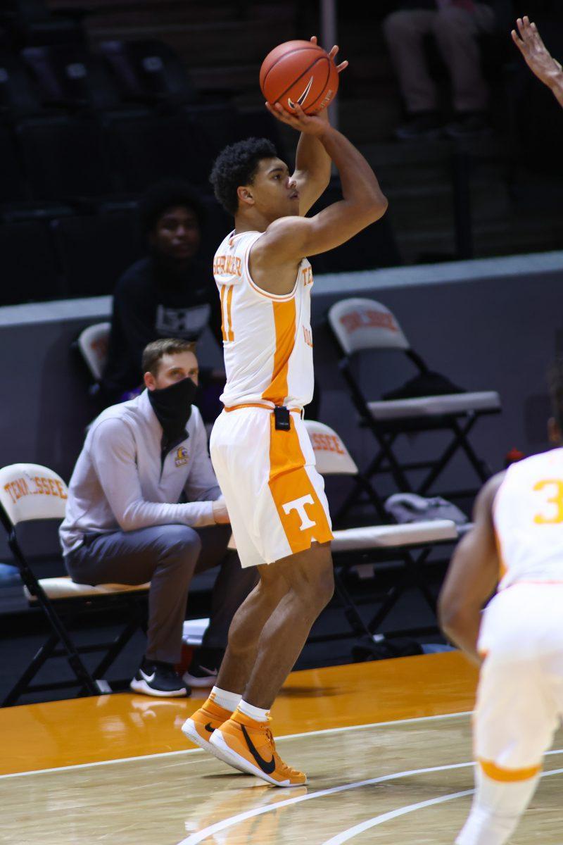 Dec 18, 2020; Knoxville, Tennessee, USA; Tennessee Volunteers guard Jaden Springer (11) shoots the ball against the Tennessee Tech Golden Eagles during the first half at Thompson-Boling Arena. Mandatory Credit: Randy Sartin-USA TODAY Sports