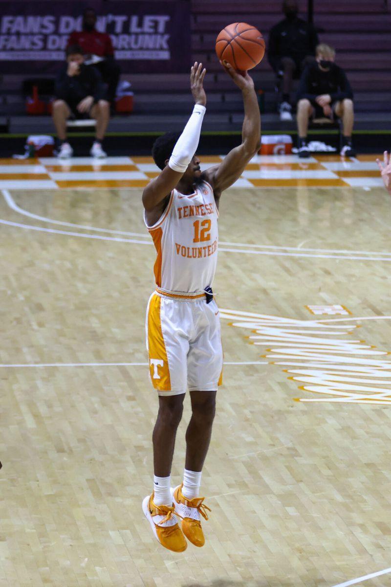 Dec 21, 2020; Knoxville, Tennessee, USA; Tennessee Volunteers guard Victor Bailey Jr. (12) shoots the ball against the Saint Joseph's Hawks during the second half at Thompson-Boling Arena. Mandatory Credit: Randy Sartin-USA TODAY Sports
