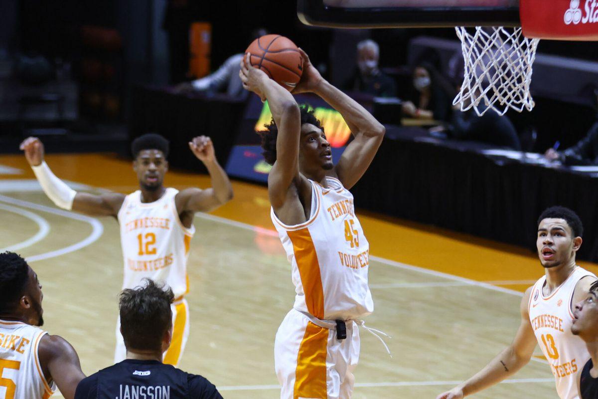 Dec 21, 2020; Knoxville, Tennessee, USA; Tennessee Volunteers guard Keon Johnson (45) dunks the ball against the Saint Joseph's Hawks during the second half at Thompson-Boling Arena. Mandatory Credit: Randy Sartin-USA TODAY Sports