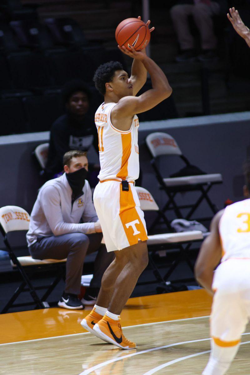 Dec 18, 2020; Knoxville, Tennessee, USA; Tennessee Volunteers guard Jaden Springer (11) shoots the ball against the Tennessee Tech Golden Eagles during the first half at Thompson-Boling Arena. Mandatory Credit: Randy Sartin-USA TODAY Sports