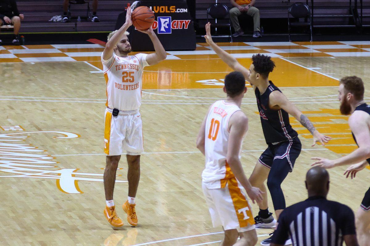 Dec 21, 2020; Knoxville, Tennessee, USA; Tennessee Volunteers guard Santiago Vescovi (25) shoots the ball against the Saint Joseph's Hawks during the second half at Thompson-Boling Arena. Mandatory Credit: Randy Sartin-USA TODAY Sports