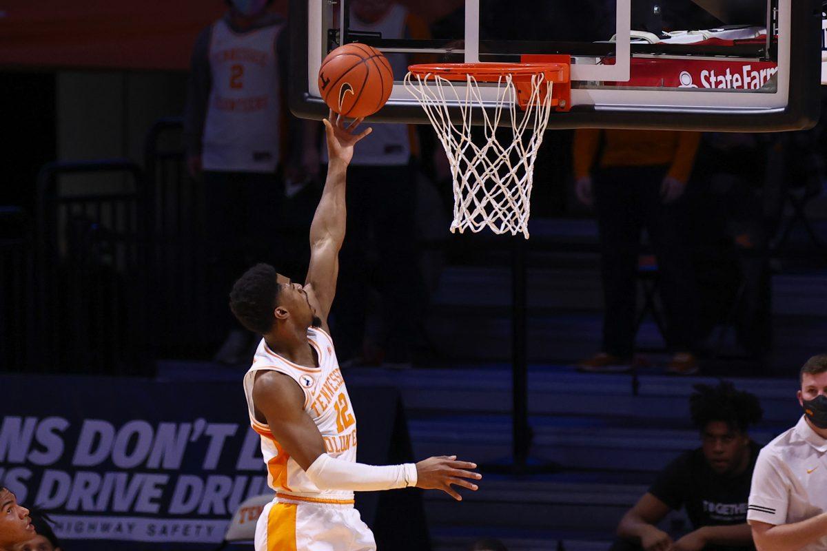Jan 23, 2021; Knoxville, Tennessee, USA; Tennessee Volunteers guard Victor Bailey Jr. (12) goes to the basket against the Missouri Tigers during the first half at Thompson-Boling Arena. Mandatory Credit: Randy Sartin-USA TODAY Sports