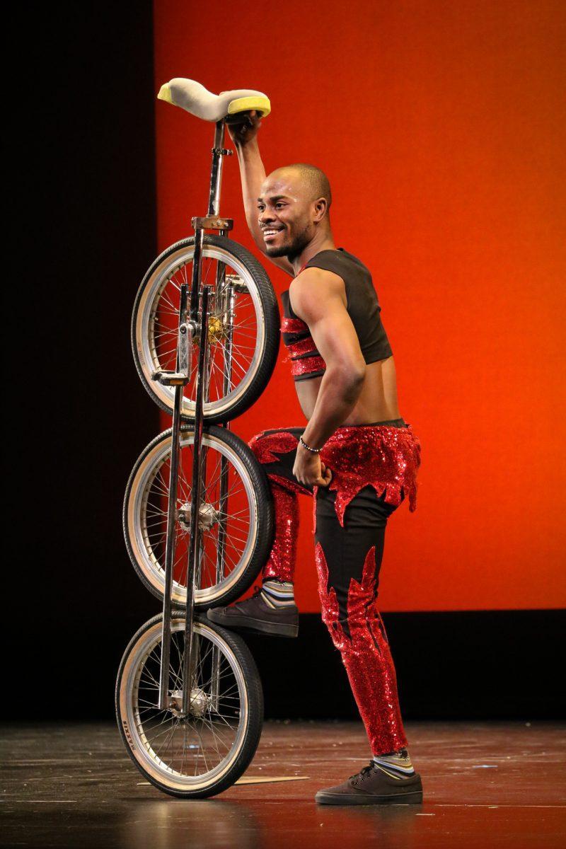 The ZuZu African Acrobats performing thrilling stunts for a captivated audience at The University of Tennessee on Feb. 22, 2021.
