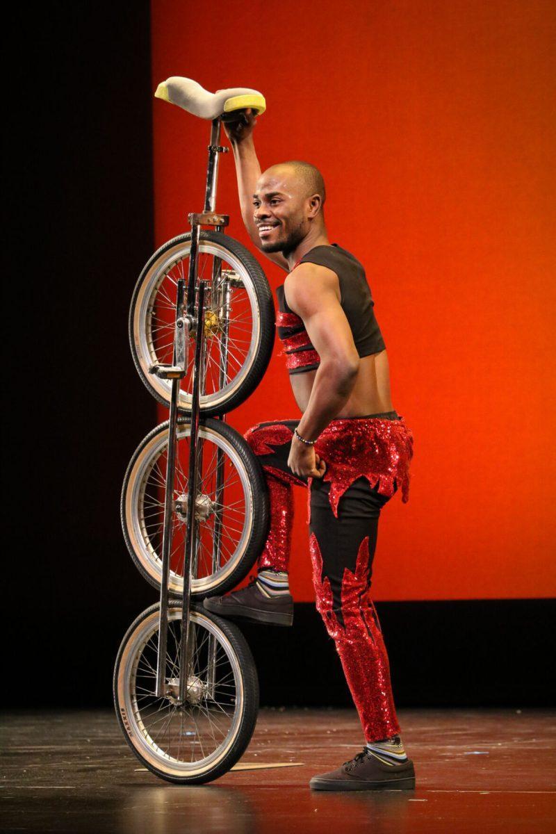 The ZuZu African Acrobats performing thrilling stunts for a captivated audience at The University of Tennessee on Feb. 22, 2021.