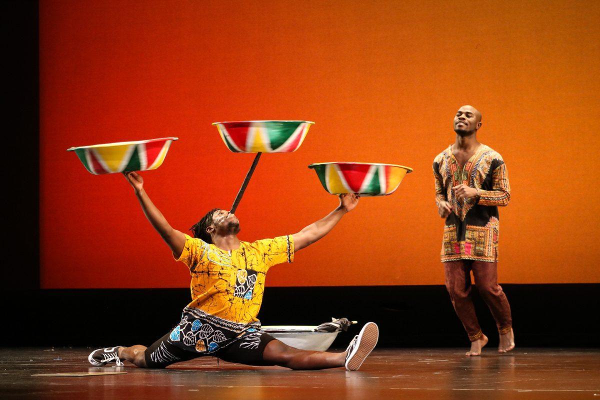 The ZuZu African Acrobats performing thrilling stunts for a captivated audience at The University of Tennessee on Feb. 22, 2021.