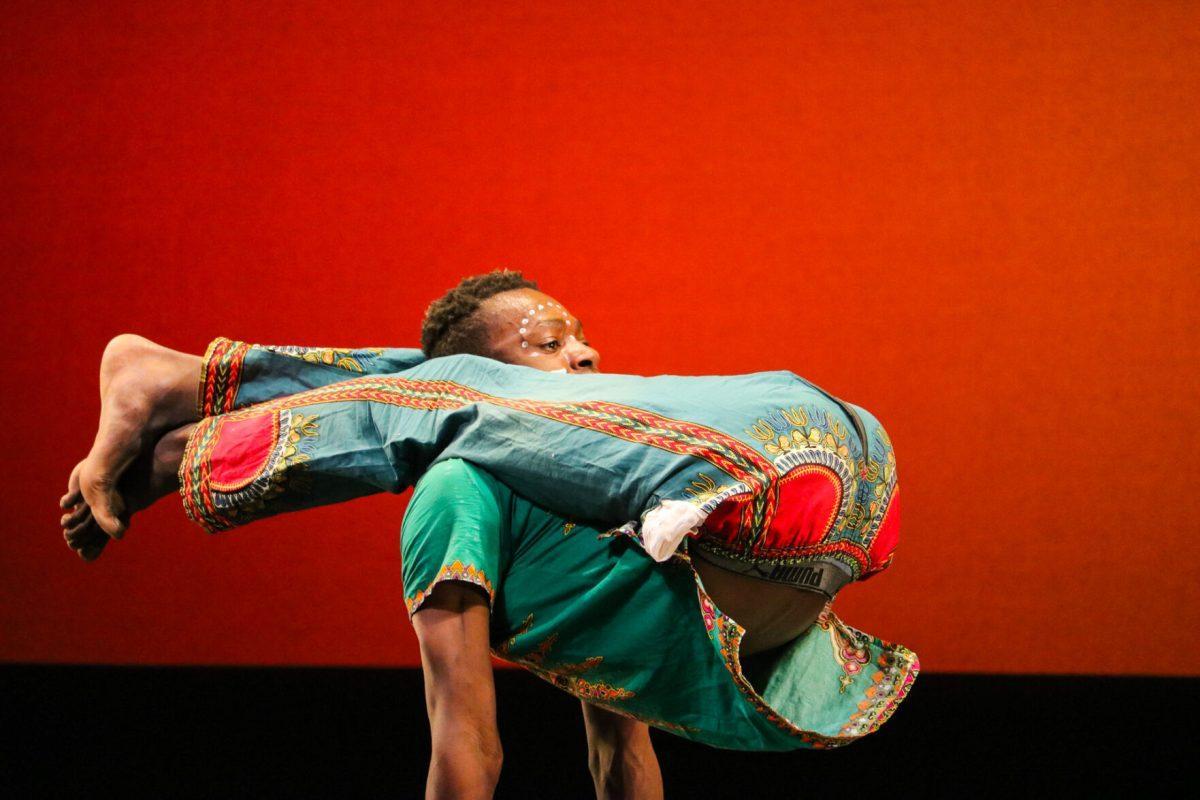 The ZuZu African Acrobats performing thrilling stunts for a captivated audience at The University of Tennessee on Feb. 22, 2021.