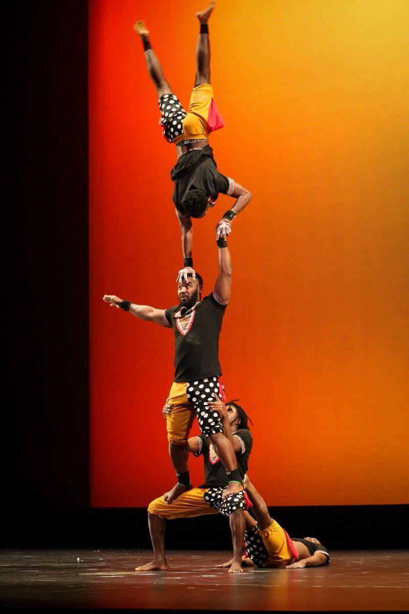 The ZuZu African Acrobats performing thrilling stunts for a captivated audience at The University of Tennessee on Feb. 22, 2021.