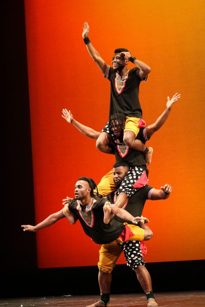 The ZuZu African Acrobats performing thrilling stunts for a captivated audience at The University of Tennessee on Feb. 22, 2021.
