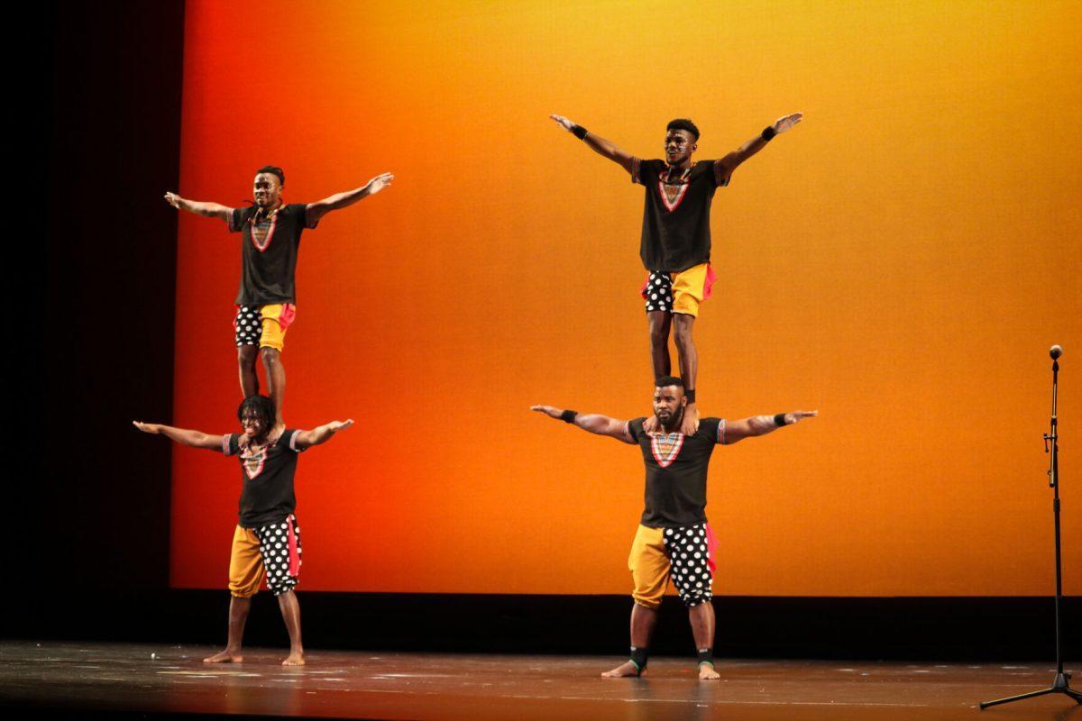 The ZuZu African Acrobats performing thrilling stunts for a captivated audience at The University of Tennessee on Feb. 22, 2021.