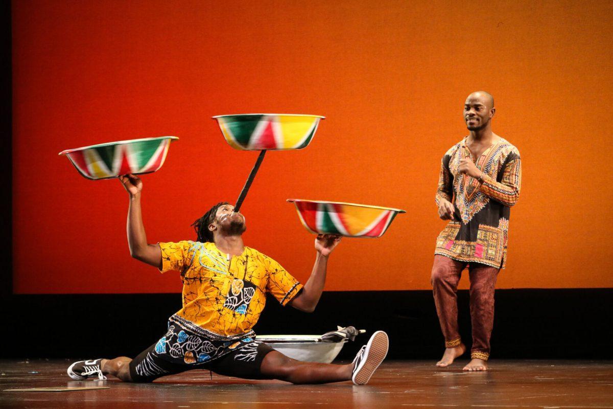 The ZuZu African Acrobats performing thrilling stunts for a captivated audience at The University of Tennessee on Feb. 22, 2021.