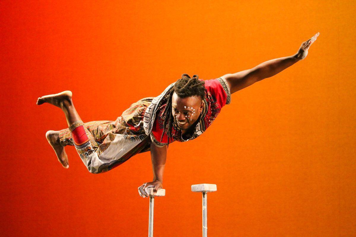 The ZuZu African Acrobats performing thrilling stunts for a captivated audience at The University of Tennessee on Feb. 22, 2021.